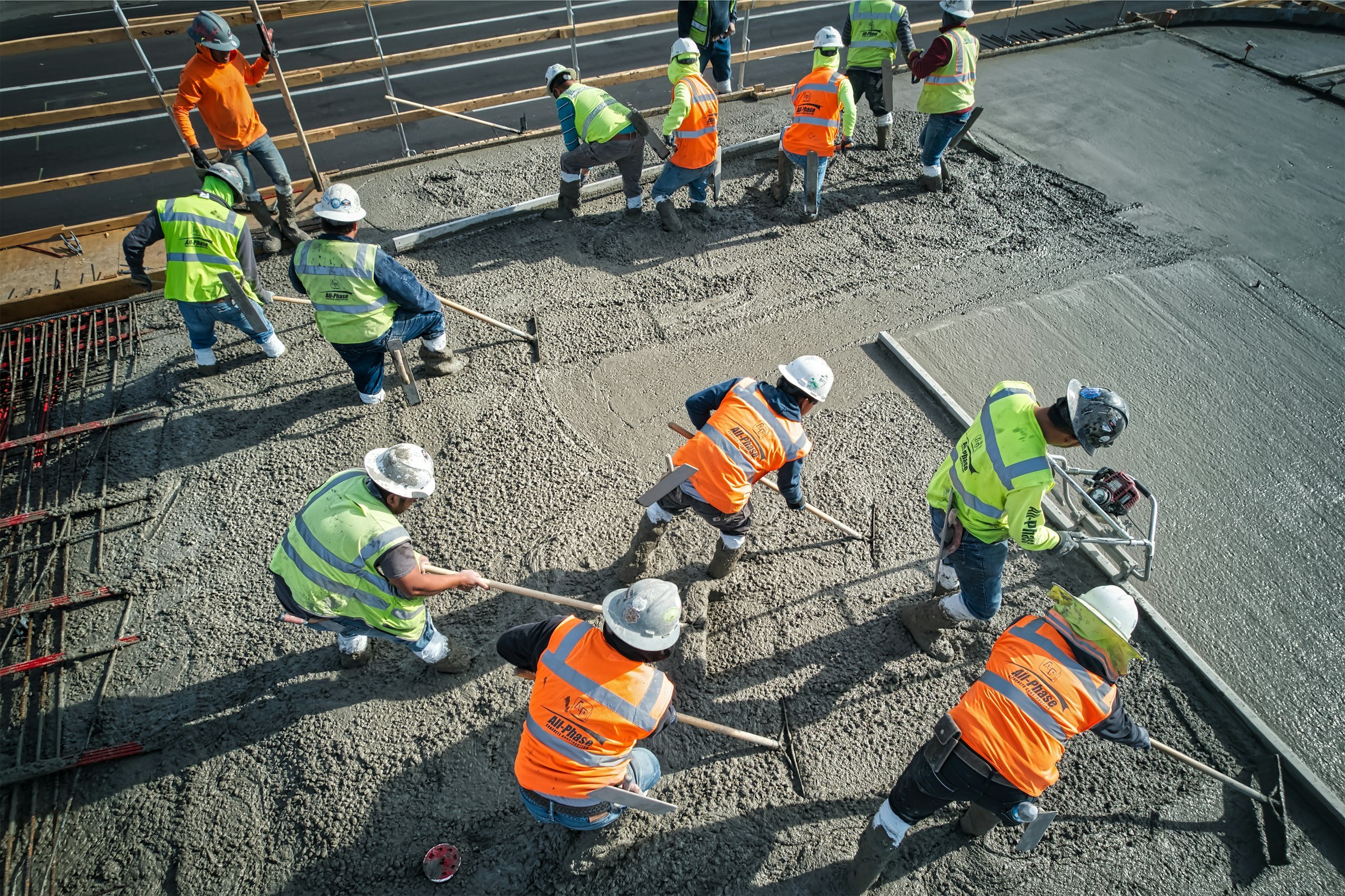 Workers in a construction site. Photo by Acton Crawford on Unsplash